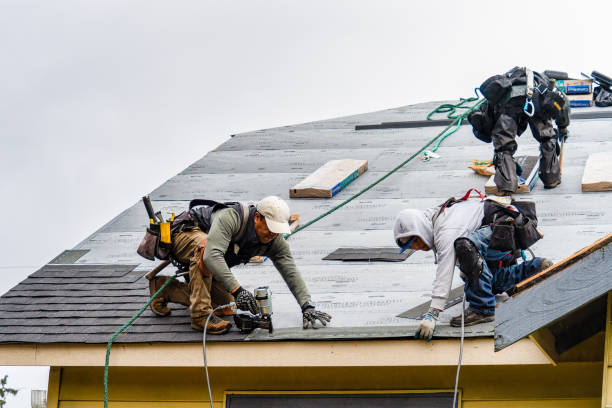 Professional Gutter Installation technician working in Union Springs, NY
